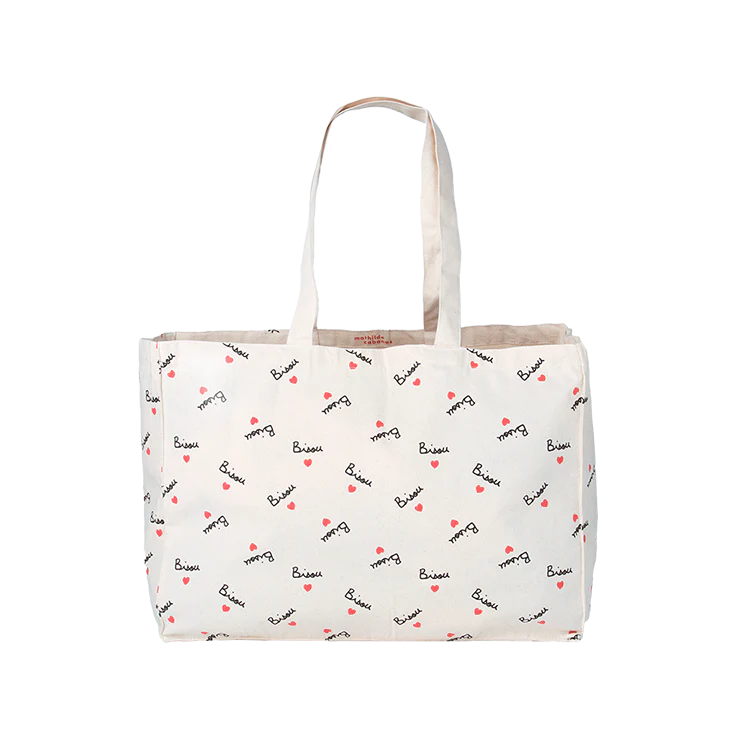 Cabas Bisou Mathilde Cabanas en coton bio, spacieux et éco-responsable, avec anses longues et imprimé durable. Un sac pratique et respectueux de l'environnement.