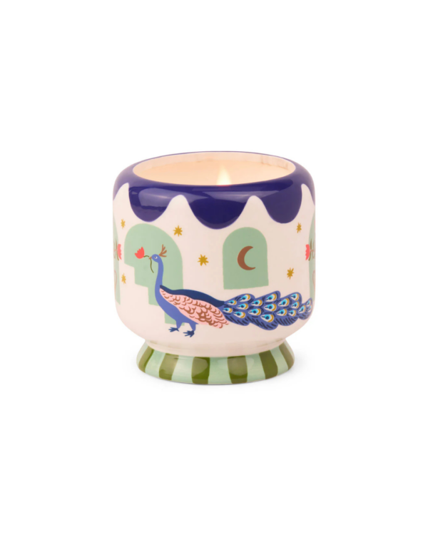 Bougie Paddywax "Paon" en céramique décorative, peinte à la main, avec des motifs colorés. Parfum floral et musqué. Cire de soja 100 % végétale.