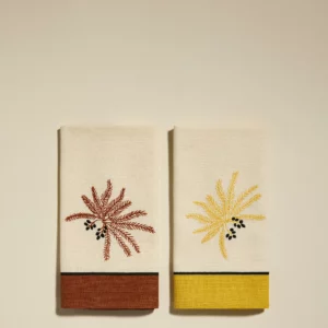 Duo de serviettes de table Phoenix terracotta, en coton avec broderie palmier, parfait pour une décoration de table estivale élégante.