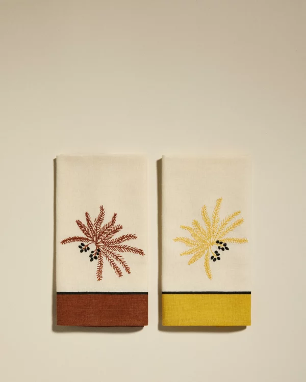 Duo de serviettes de table Phoenix terracotta, en coton avec broderie palmier, parfait pour une décoration de table estivale élégante.