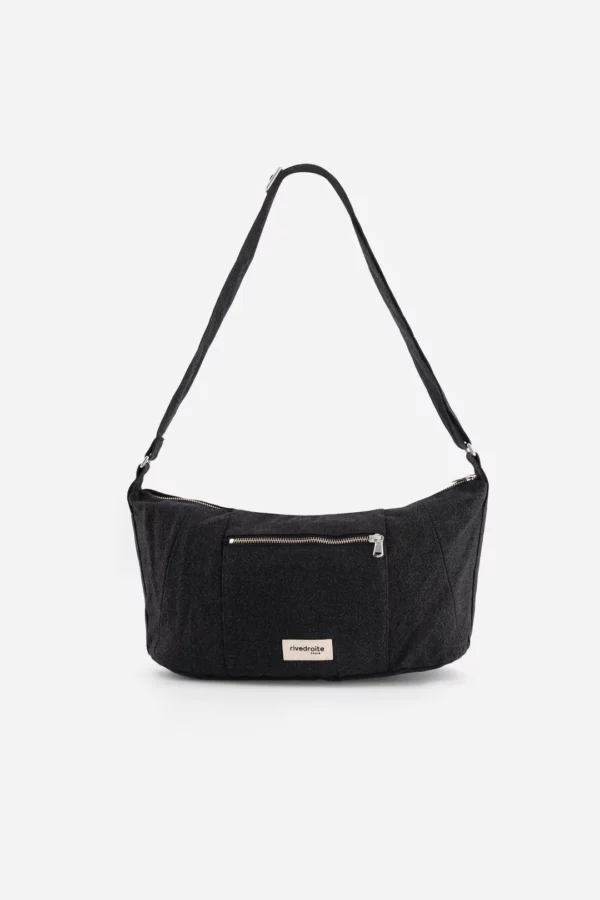 Mini Charlot sac crossbody noir en coton recyclé, avec poches zippées et bandoulière réglable pour un porté à l’épaule ou en bandoulière.