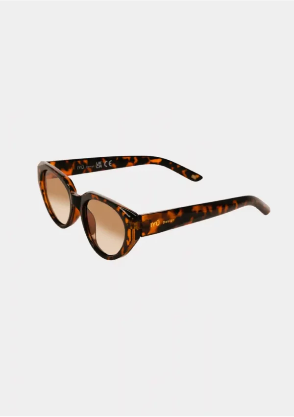 Lunettes de soleil Jade écailles marron, modèle rétro élégant et intemporel, pour un look chic et sophistiqué.