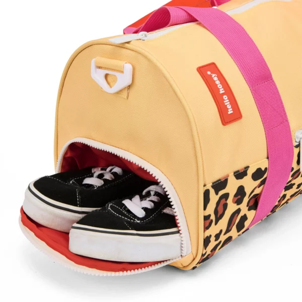 Sac de sport enfant motif léopard, avec bandoulière ajustable, poche à chaussures et tissu en polyester recyclé