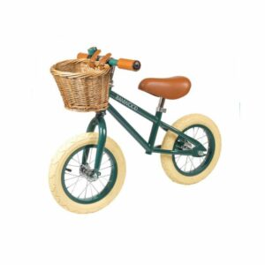 Draisienne Banwood First Go en vert foncé avec panier en osier, style vintage pour enfant de 2 à 5 ans.