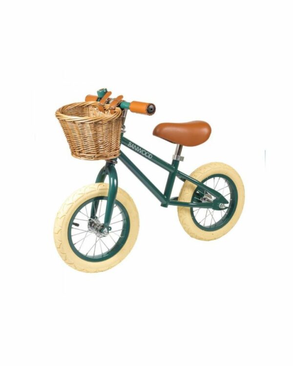 Draisienne Banwood First Go en vert foncé avec panier en osier, style vintage pour enfant de 2 à 5 ans.