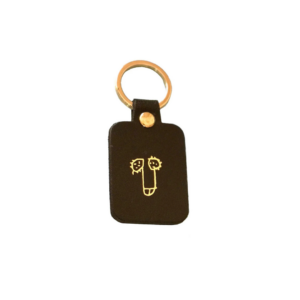 Porte-clés rectangulaire en cuir noir avec illustration minimaliste d’un zizi, design humoristique