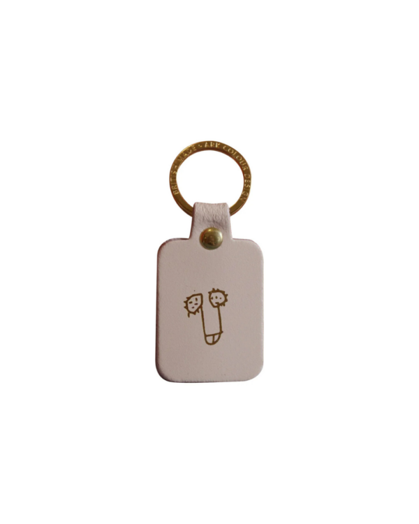 Porte-clés rectangulaire en cuir beige avec illustration minimaliste d’un zizi