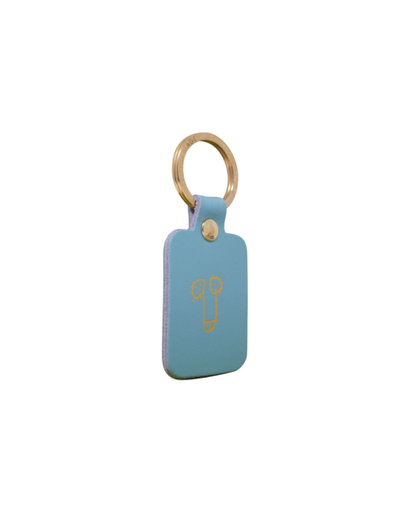 Porte-clés rectangulaire en cuir bleu avec illustration minimaliste d’un zizi