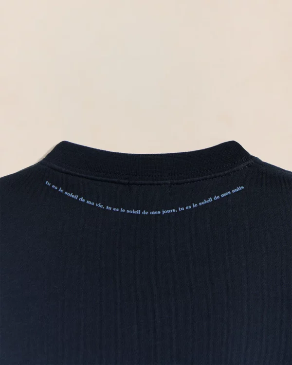 Sweat femme Cœur Solaire bleu en coton bio avec coudières brodées, signé émoi émoi.