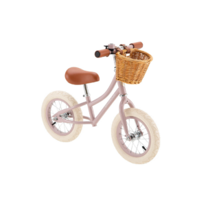 Draisienne Banwood First Go rose poudré avec panier en osier et clochette, guidon et selle réglables pour enfant.