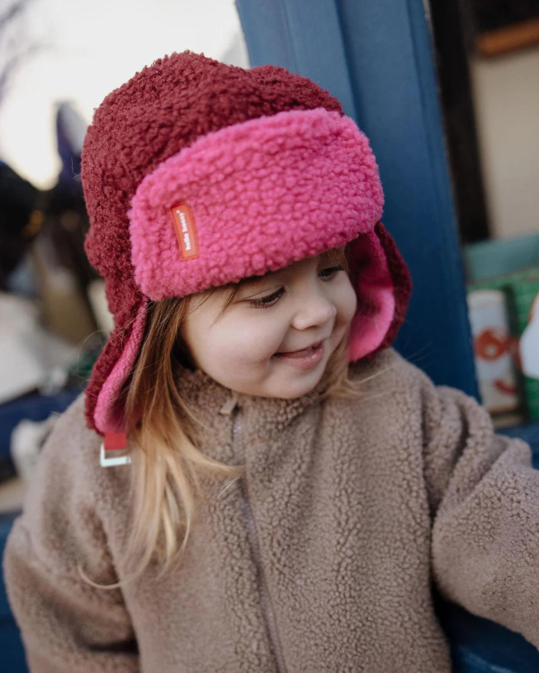 Chapka Cozy Tara pour bébé et enfant bicolore en moumoute avec doublure polaire, ajustable avec liens, certifiée Oeko-Tex