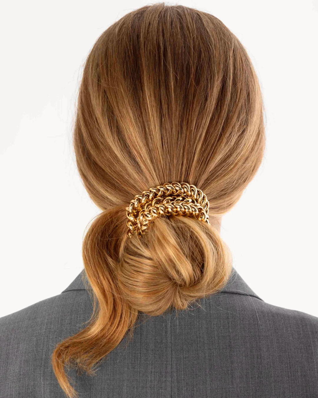 BICHOUS® Chaîne Doré – l’élastique pour cheveux qui se porte comme un bijou.